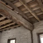 The exposed wooden beam of an old Eastern Anatolian building.