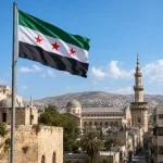 Syrian flag with Damascus architecture.